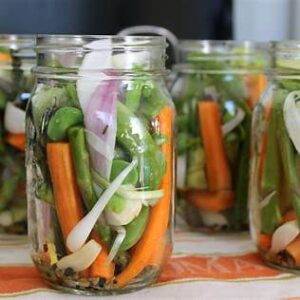 preserving homegrown vegetables in jars for long term food storage 